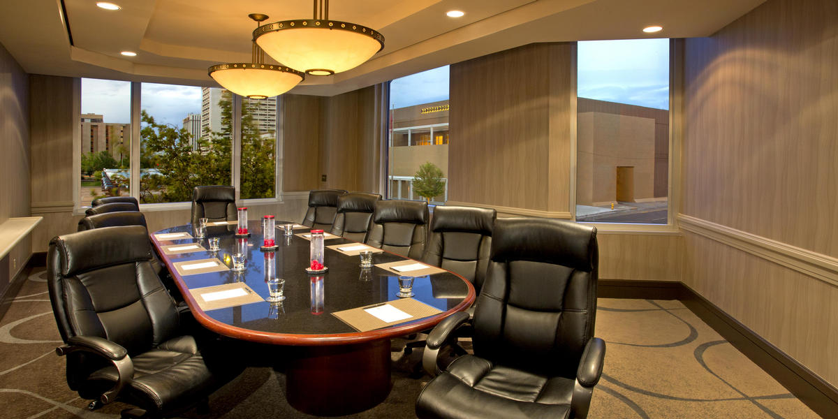 Table and Chairs in boardroom set up for meeting